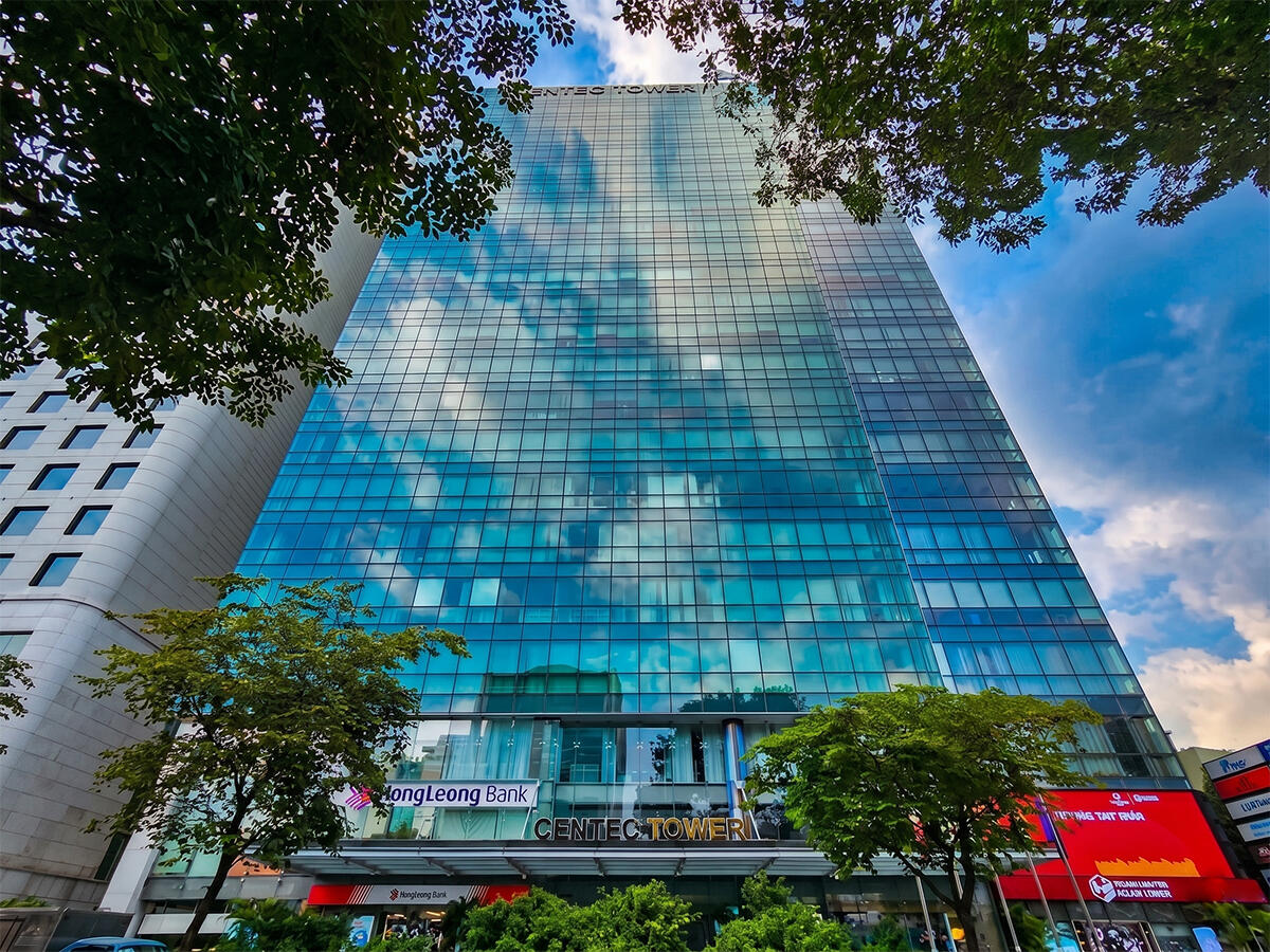 Glass building facade clouds Centec Tower
