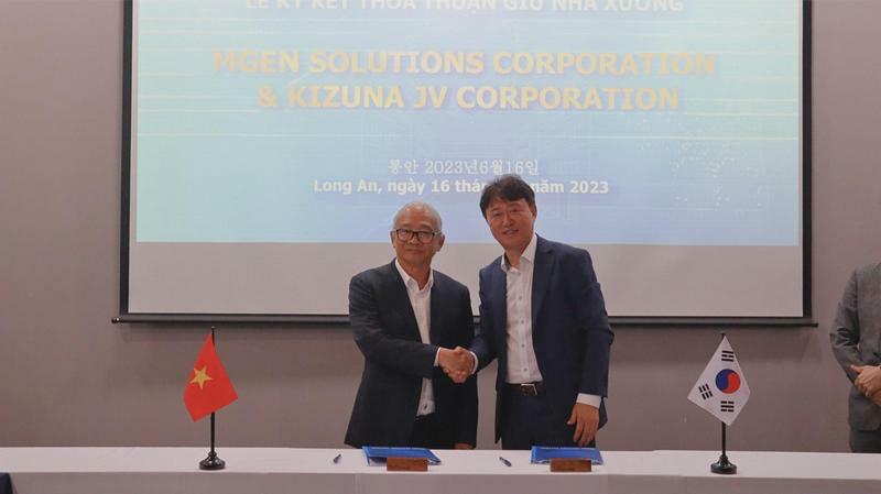 Factory lease agreement signing moment